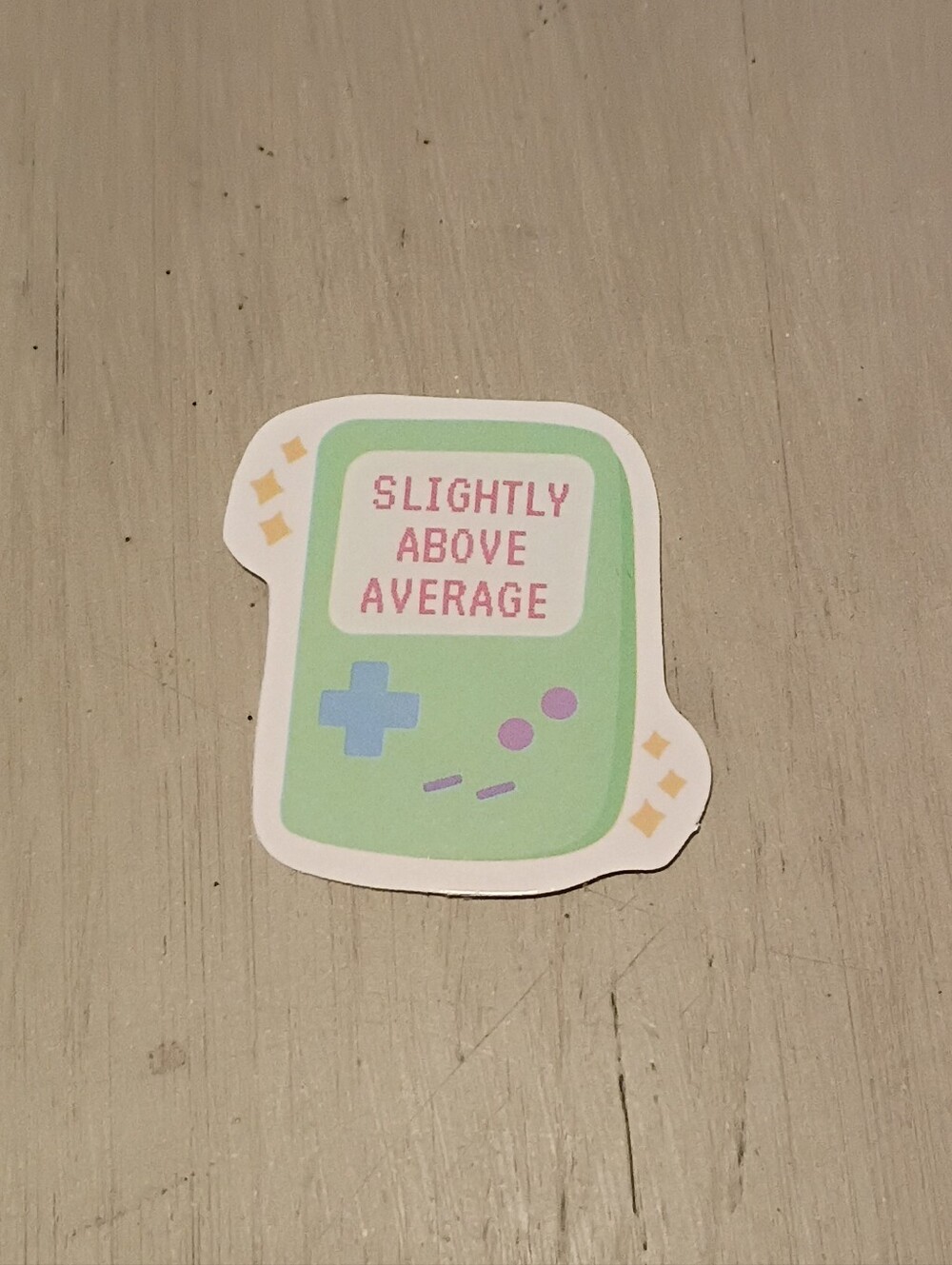 10/$10 Sticker Decal - Slightly Above Average Green Handheld Video Game Device